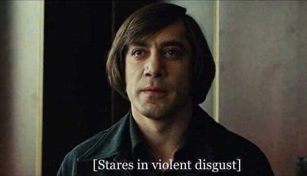 No Country for Old Men Anton Chigurh Stares in violent disgust Blank Meme Template