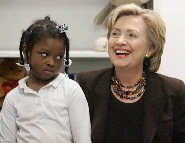 High Quality Hillary Clinton getting side eye from little black girl Blank Meme Template