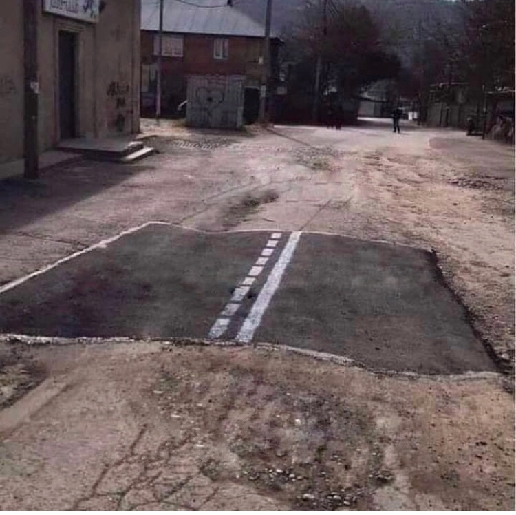 partialy paved road Blank Meme Template