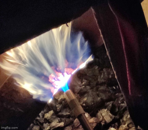 Blowtorch against wood | image tagged in fire | made w/ Imgflip meme maker