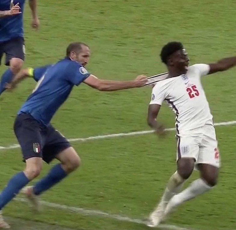 Chiellini pulling on Saka Blank Meme Template