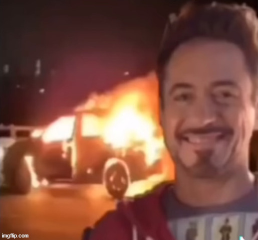 No context whatsoever. Just the Marvel cast posing in front of burning stuff. What am I doing with my life? | image tagged in robert downey jr | made w/ Imgflip meme maker