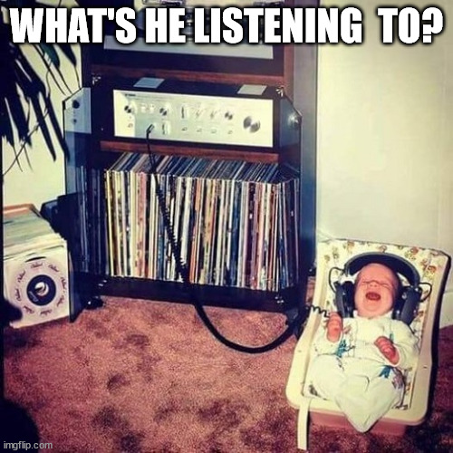 headphones | WHAT'S HE LISTENING  TO? | image tagged in music | made w/ Imgflip meme maker