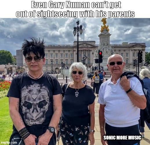 Gary Numan | Even Gary Numan can't get out of sightseeing with his parents; SONIC MORE MUSIC | image tagged in gary numan,goth,new wave,music | made w/ Imgflip meme maker