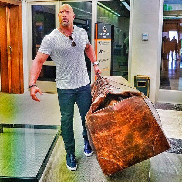 The Rock Carrying Giant Bag Blank Meme Template