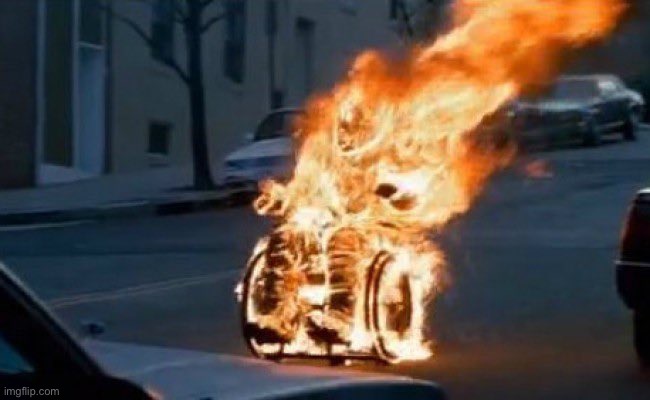 Man in Chair on Fire | image tagged in man in chair on fire | made w/ Imgflip meme maker