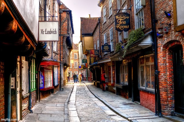 Old street in New York. Looks like Diagon Alley | image tagged in awesome,unfunny | made w/ Imgflip meme maker