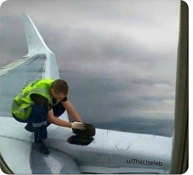 Guy fixing plane mid-flight Blank Meme Template