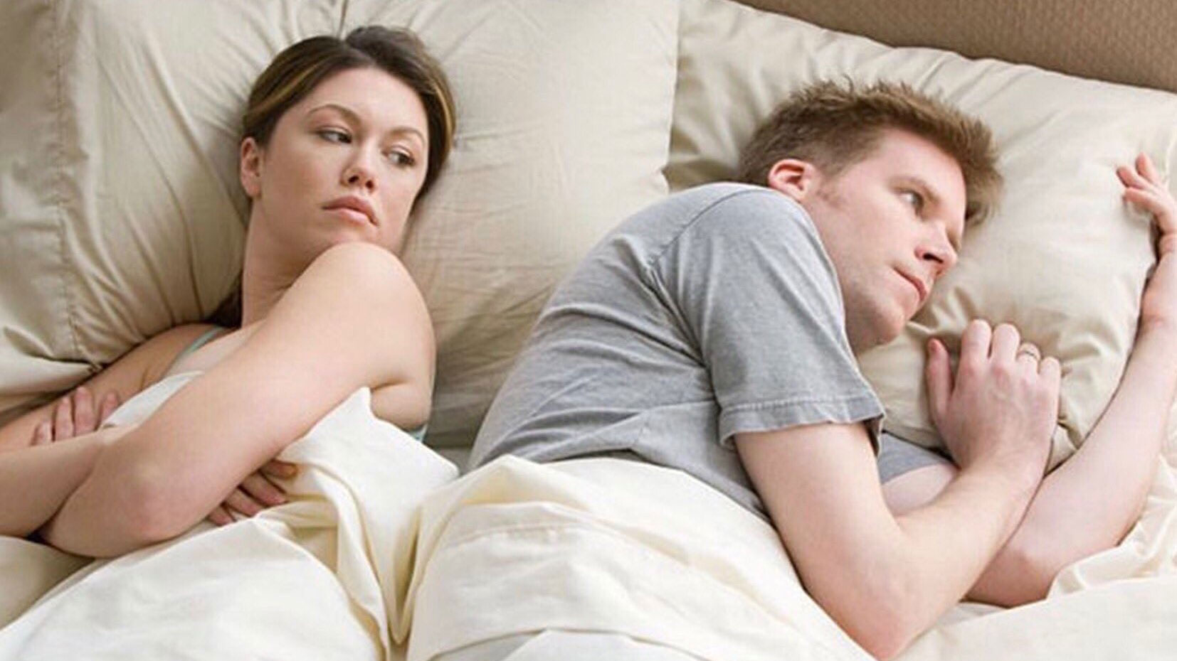 Woman in bed looking at man Blank Meme Template