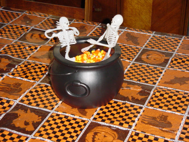 Two skeletons in candy corn hot tub Blank Meme Template