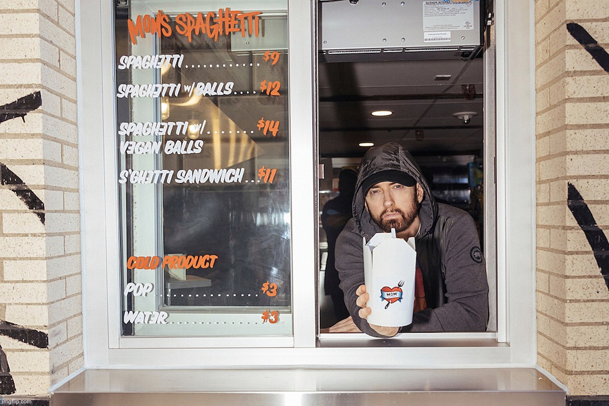 just a picture of eminem serving food at his new restaurant moms spaghetti. | made w/ Imgflip meme maker