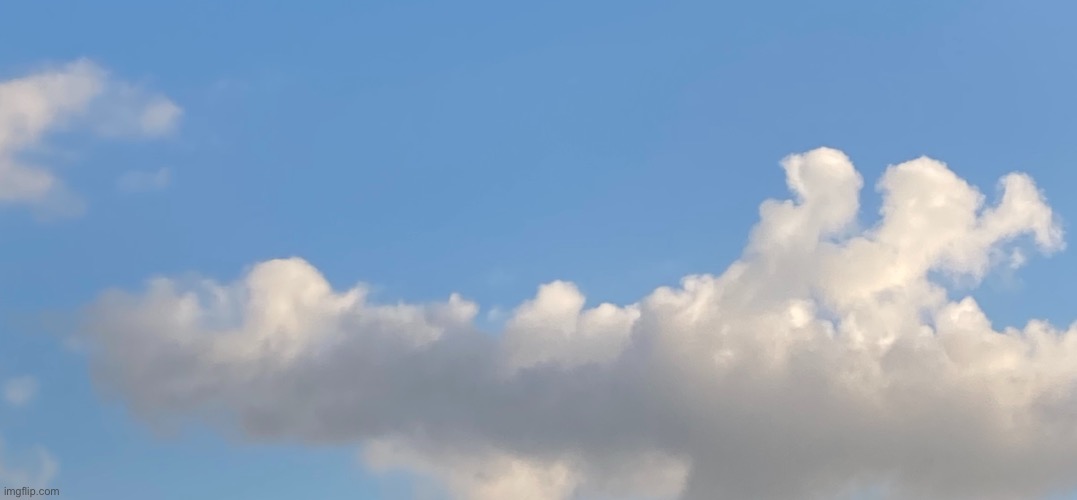 This is a photo I just took a minute ago of a cloud giving a thumbs up | made w/ Imgflip meme maker