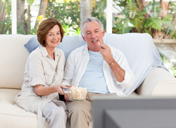 High Quality Middle-aged couple watching tv Blank Meme Template