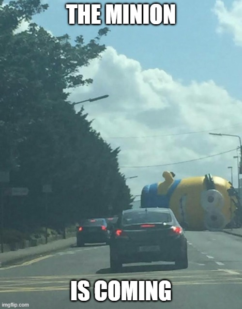 Holy Moly | THE MINION; IS COMING | image tagged in inflatable minion | made w/ Imgflip meme maker