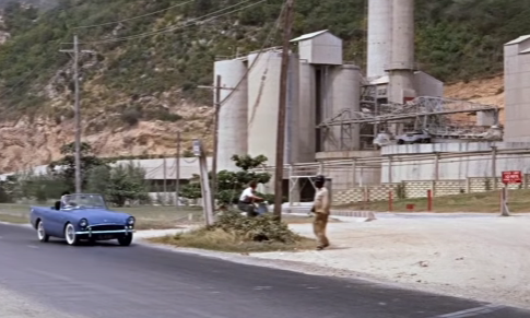 High Quality Bond driving past factory. Blank Meme Template