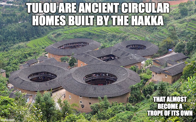 Tulou | TULOU ARE ANCIENT CIRCULAR HOMES BUILT BY THE HAKKA; THAT ALMOST BECOME A TROPE OF ITS OWN | image tagged in building,memes | made w/ Imgflip meme maker