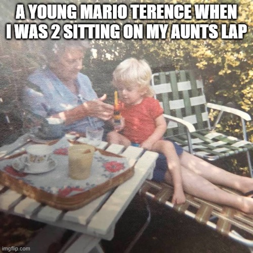 Mario Terence | A YOUNG MARIO TERENCE WHEN I WAS 2 SITTING ON MY AUNTS LAP | image tagged in mario terence with my aunty | made w/ Imgflip meme maker