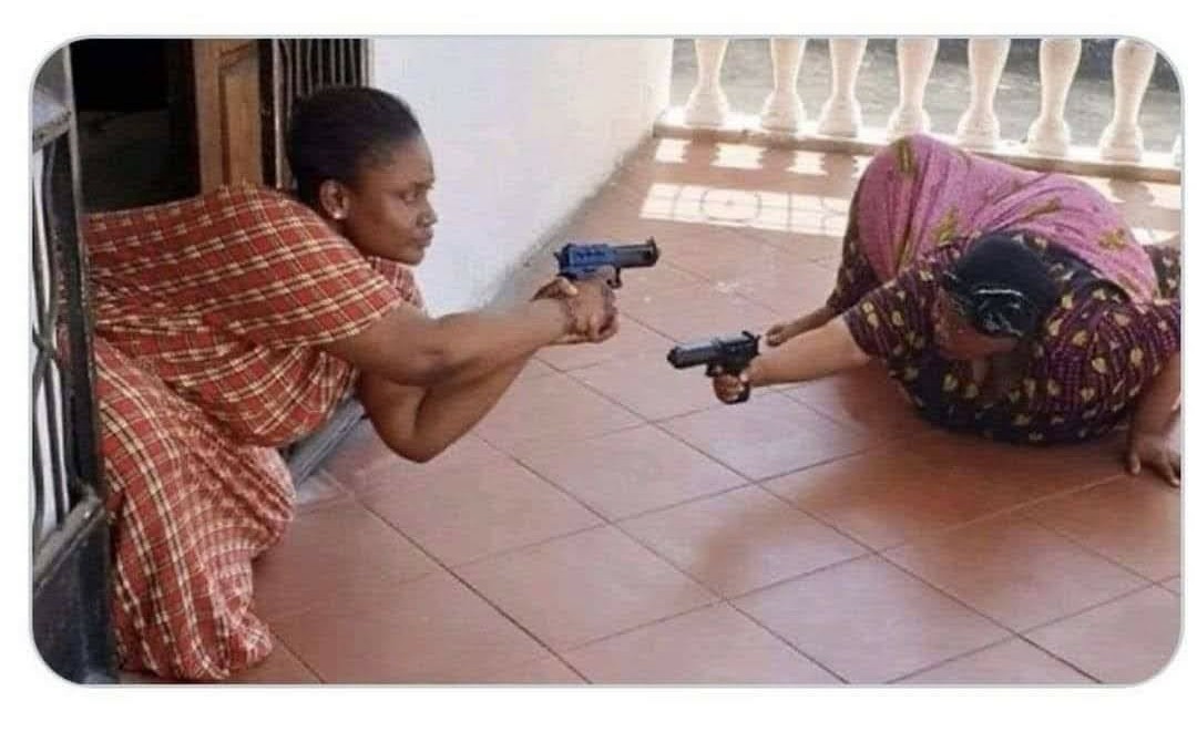 Black ladies pointing guns Blank Meme Template