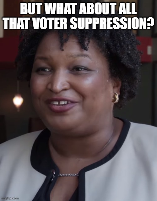 Stacy Abrams | BUT WHAT ABOUT ALL THAT VOTER SUPPRESSION? | image tagged in stacy abrams | made w/ Imgflip meme maker