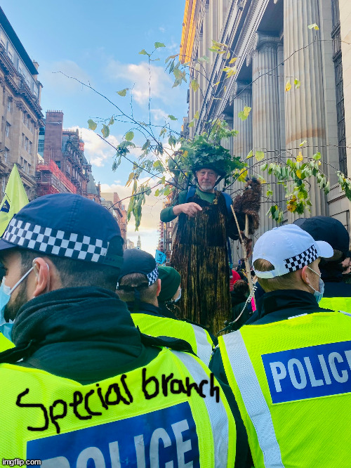 Are you special branch | image tagged in cop,climate change,activism,cops | made w/ Imgflip meme maker