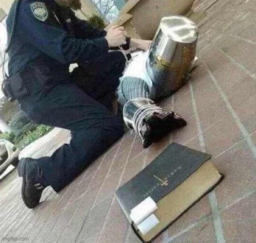Arrested crusader reaching for book | image tagged in arrested crusader reaching for book | made w/ Imgflip meme maker