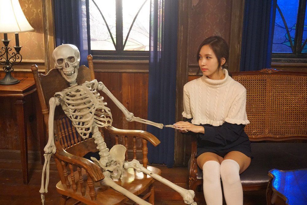 Twice Mina holding a skeleton's hand Blank Meme Template