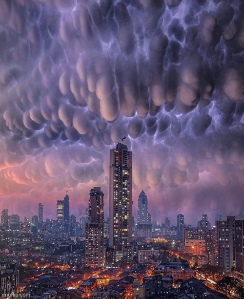 Purple cloud invasion | image tagged in purple,cloud,invasion,city,night sky,awesome | made w/ Imgflip meme maker