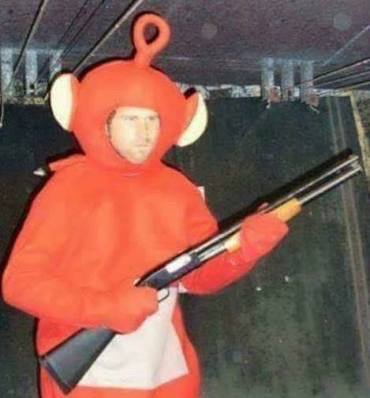 teletubbie with a shotgun Blank Meme Template