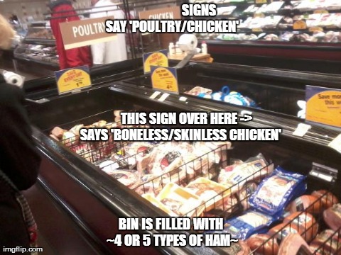 SIGNS SAY 'POULTRY/CHICKEN' BIN IS FILLED WITH ~4 OR 5 TYPES OF HAM~            THIS SIGN OVER HERE ->       SAYS 'BONELESS/SKINLESS CHICKEN | image tagged in grocery trough | made w/ Imgflip meme maker