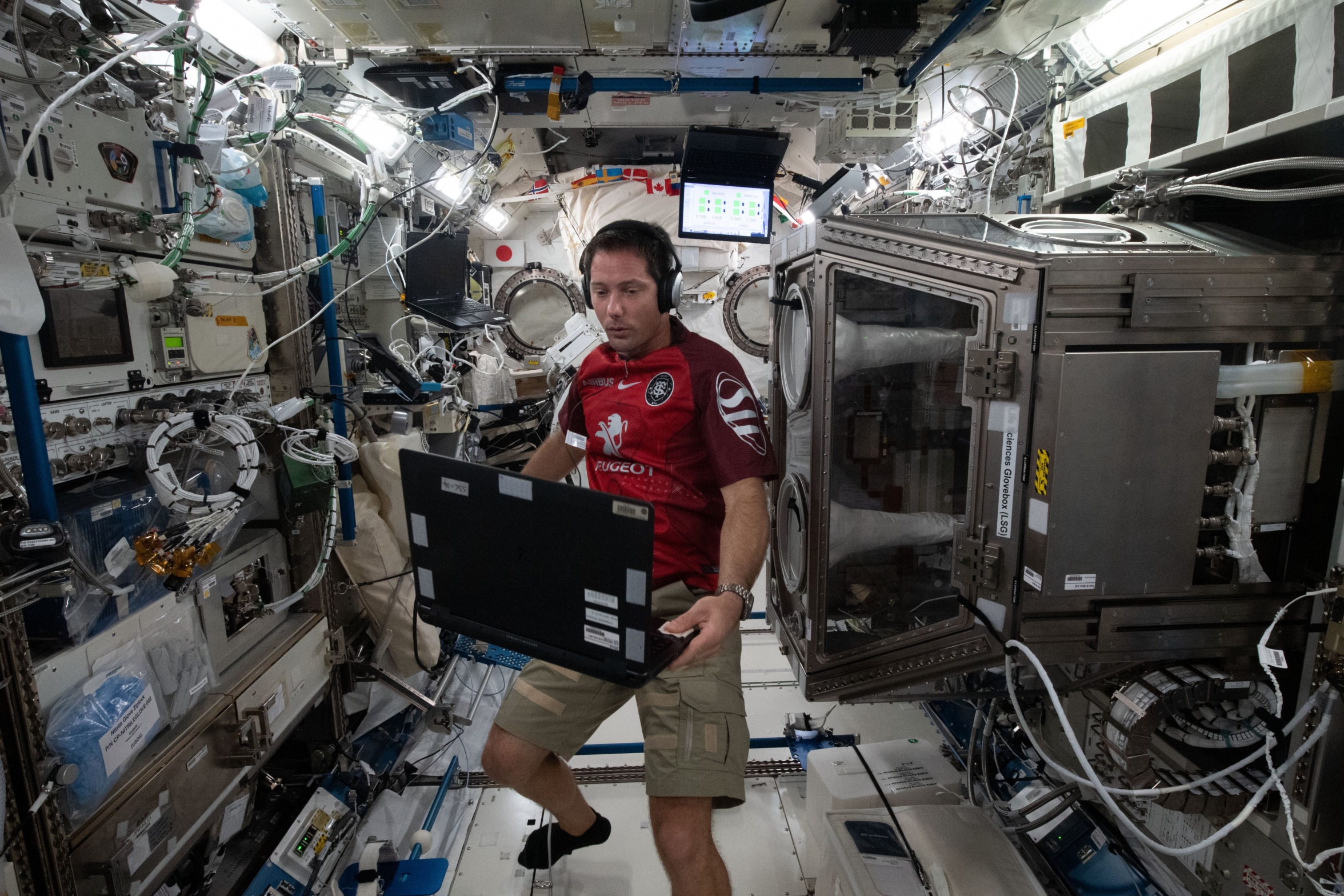 Thomas Pesquet with computer on ISS Blank Meme Template