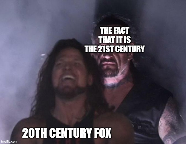 insert clever title | THE FACT THAT IT IS THE 21ST CENTURY; 20TH CENTURY FOX | image tagged in man behind man | made w/ Imgflip meme maker