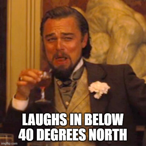 LAUGHS IN BELOW 40 DEGREES NORTH | image tagged in memes,laughing leo | made w/ Imgflip meme maker