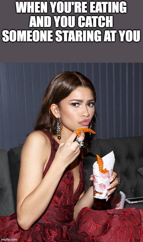 When You're Eating And Someone's Staring At You | WHEN YOU'RE EATING AND YOU CATCH SOMEONE STARING AT YOU | image tagged in zendaya,eating,staring,funny,funny memes,memes | made w/ Imgflip meme maker