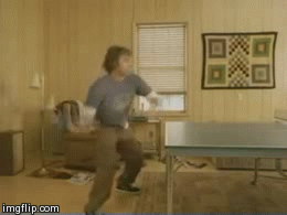 Dogs playing ping pong