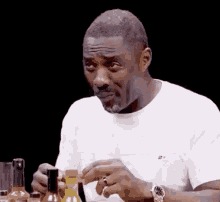 High Quality edris elba chokeing on spicy chikcen wings Blank Meme Template