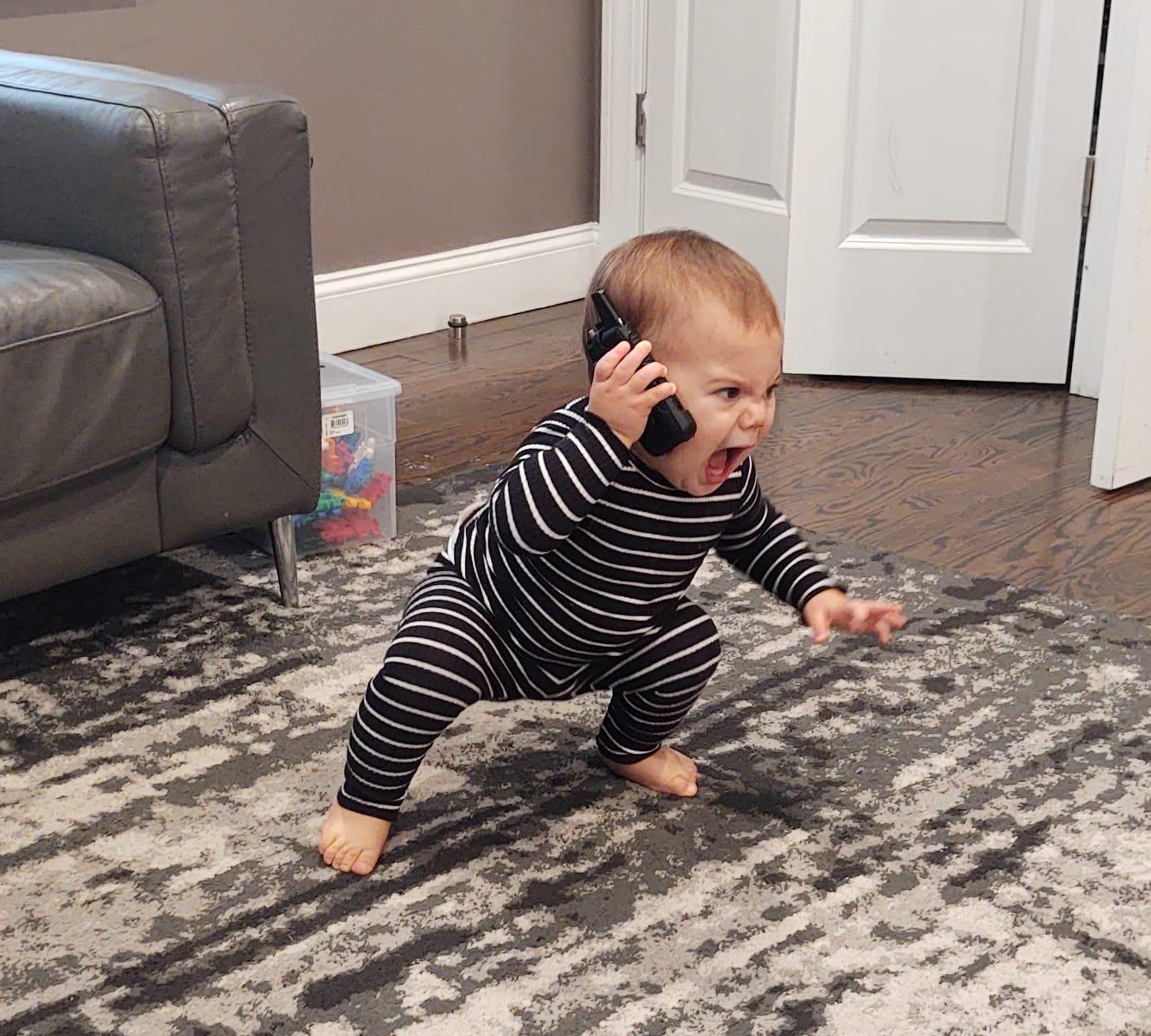 High Quality baby screams into phone Blank Meme Template