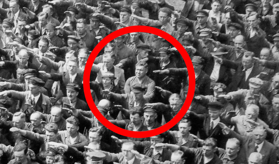 High Quality Man in the crowd not doing the nazi salute Blank Meme Template