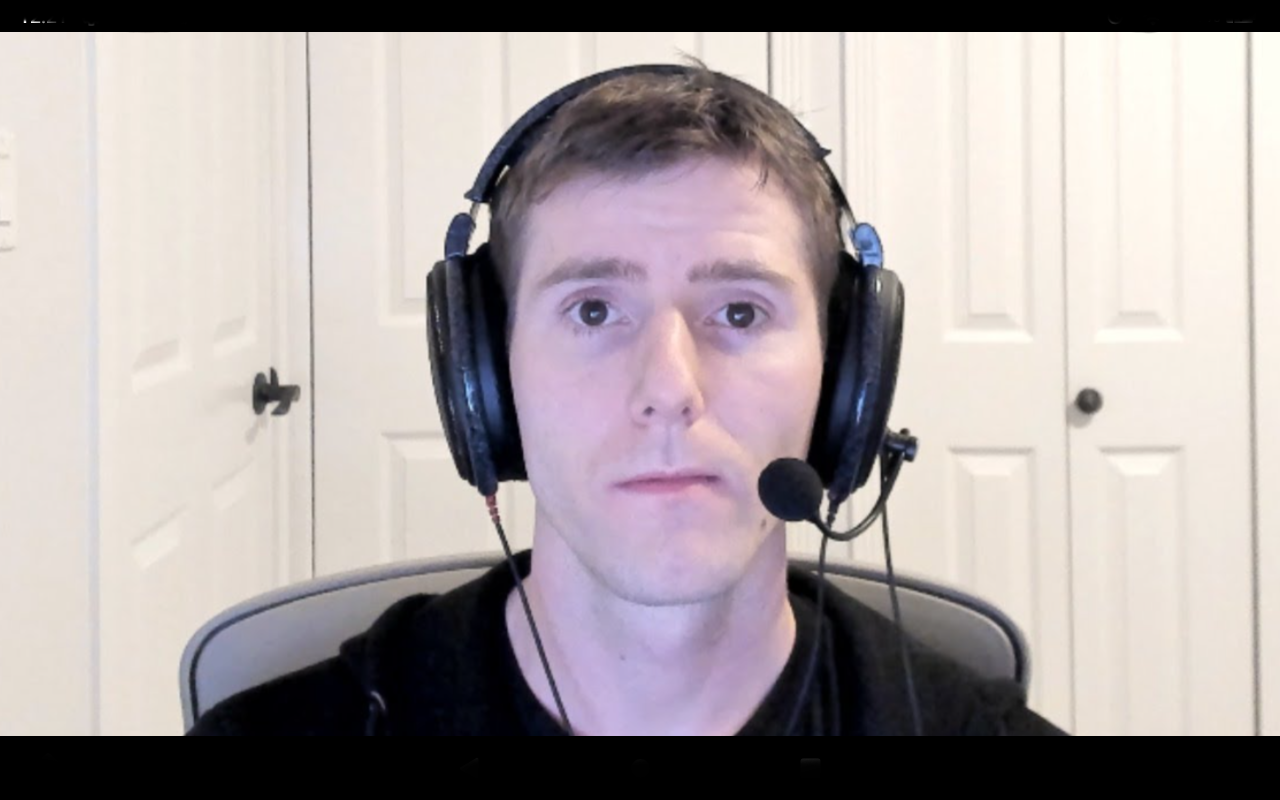 Guy with headphones staring at camera Blank Meme Template