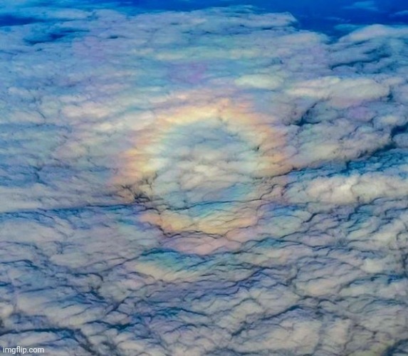 Circular Rainbow in the clouds | image tagged in sky,clouds,beautiful nature | made w/ Imgflip meme maker