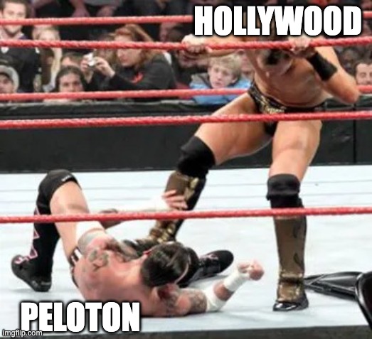 Hollywood kicks Peloton when down | HOLLYWOOD; PELOTON | image tagged in peloton,hollywood,kick | made w/ Imgflip meme maker