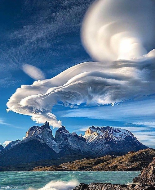 Lenticular Clouds- Torres del Paine, Chilean Patagonia  Photo by Michael Fung | image tagged in clouds,mountains,awesome,photography,beautiful nature | made w/ Imgflip meme maker