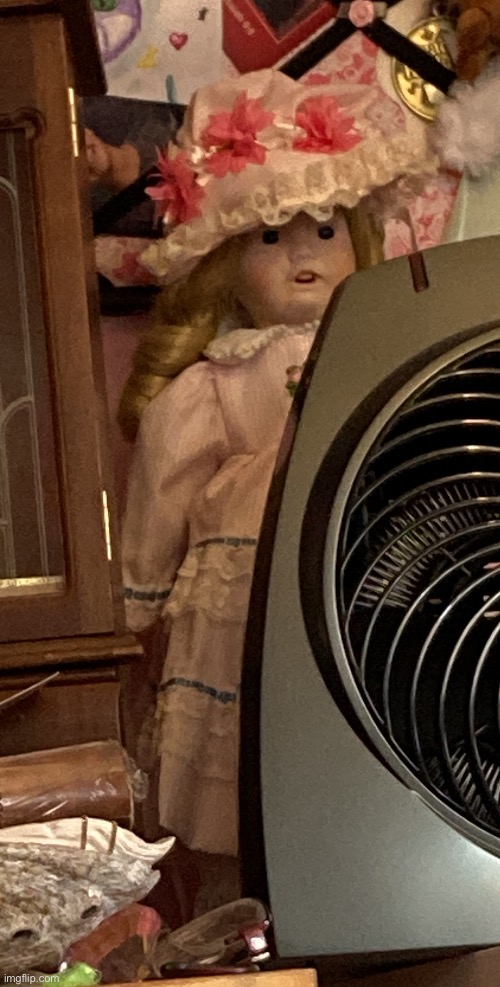 1 of my mom’s old porcelain dolls that now belong to my sis | image tagged in doll,porcelain doll,scary doll,demon doll,i swear it s plotting my murder,help | made w/ Imgflip meme maker