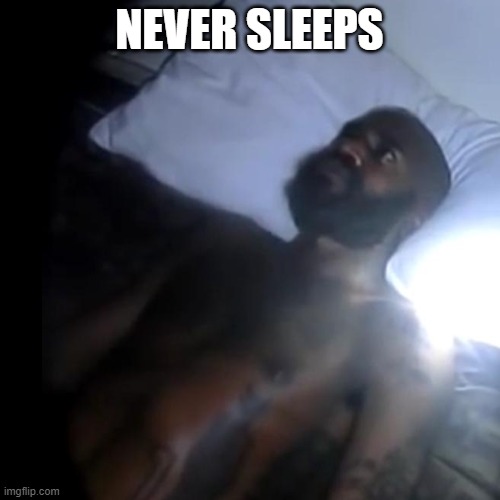 Black man wide awake at night | NEVER SLEEPS | image tagged in black man wide awake at night | made w/ Imgflip meme maker