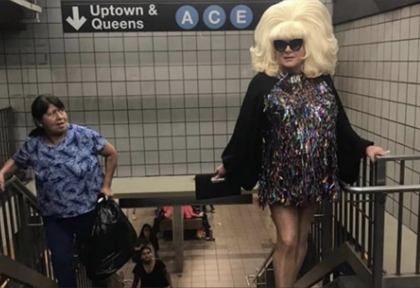 lady bunny out subway stairs woman Blank Meme Template