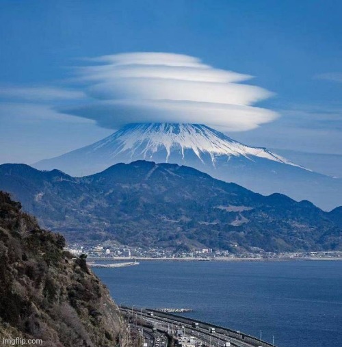 Mount Fuji , Japan | image tagged in shout it from the mountain tops,clouds,mountain,japan | made w/ Imgflip meme maker