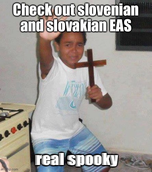 ha | Check out slovenian and slovakian EAS; real spooky | image tagged in kid with cross | made w/ Imgflip meme maker