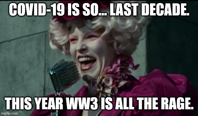 WW3 is Fashionable this year | COVID-19 IS SO... LAST DECADE. THIS YEAR WW3 IS ALL THE RAGE. | image tagged in happy hunger games,ww3 | made w/ Imgflip meme maker