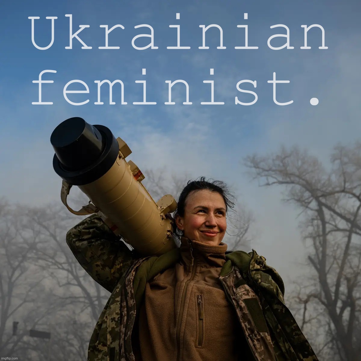 Ukrainian commander of anti-tank missile unit hoists her Stugna-P missile launcher after an ambush on Russian troops near Kiev. | Ukrainian feminist. | image tagged in ukrainian missile launcher,ukraine,ukrainian lives matter,ukrainian,feminist,feminism | made w/ Imgflip meme maker