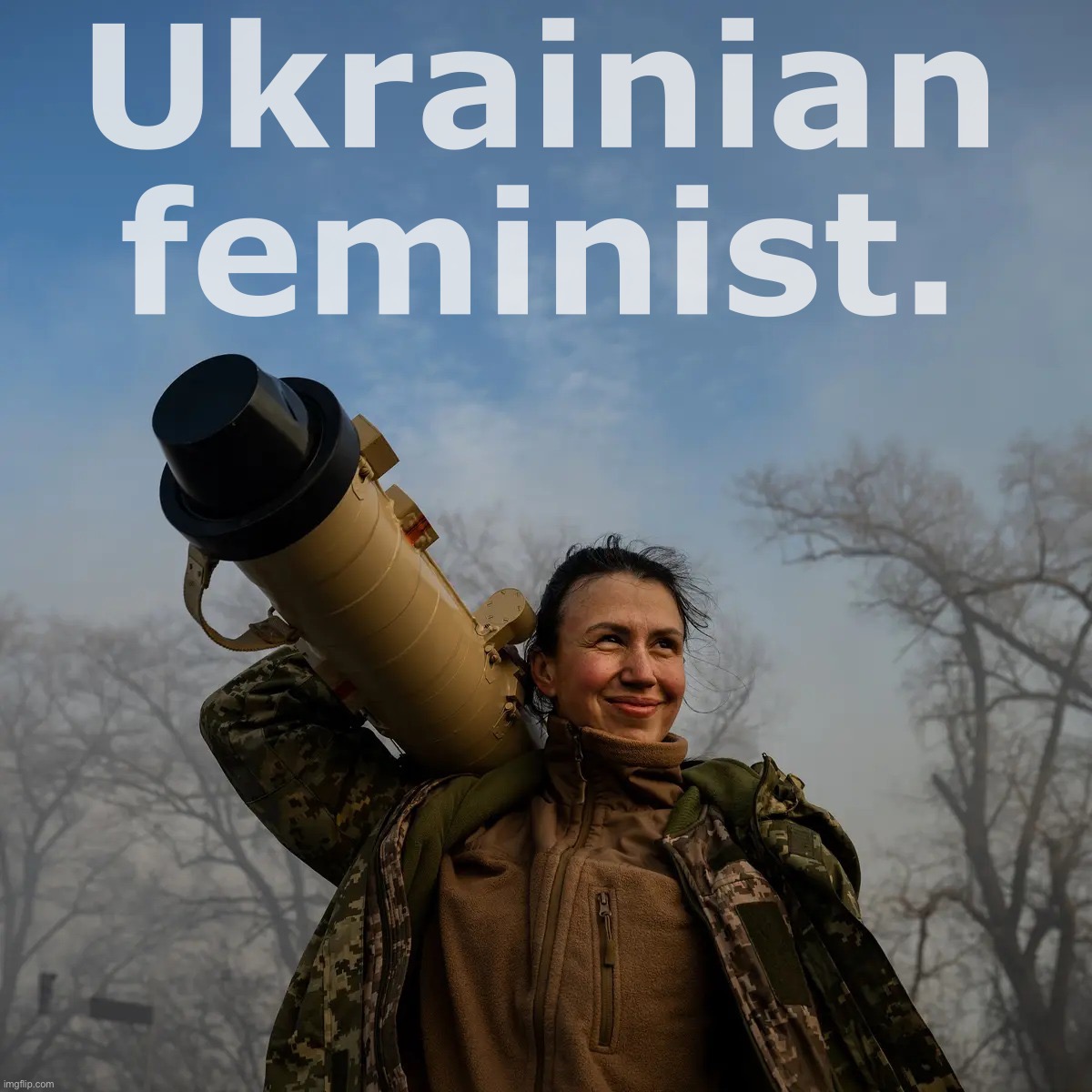 Ukrainian commander of anti-tank missile unit hoists her Stugna-P missile launcher after an ambush on Russian troops near Kiev. | Ukrainian feminist. | image tagged in ukrainian missile launcher | made w/ Imgflip meme maker