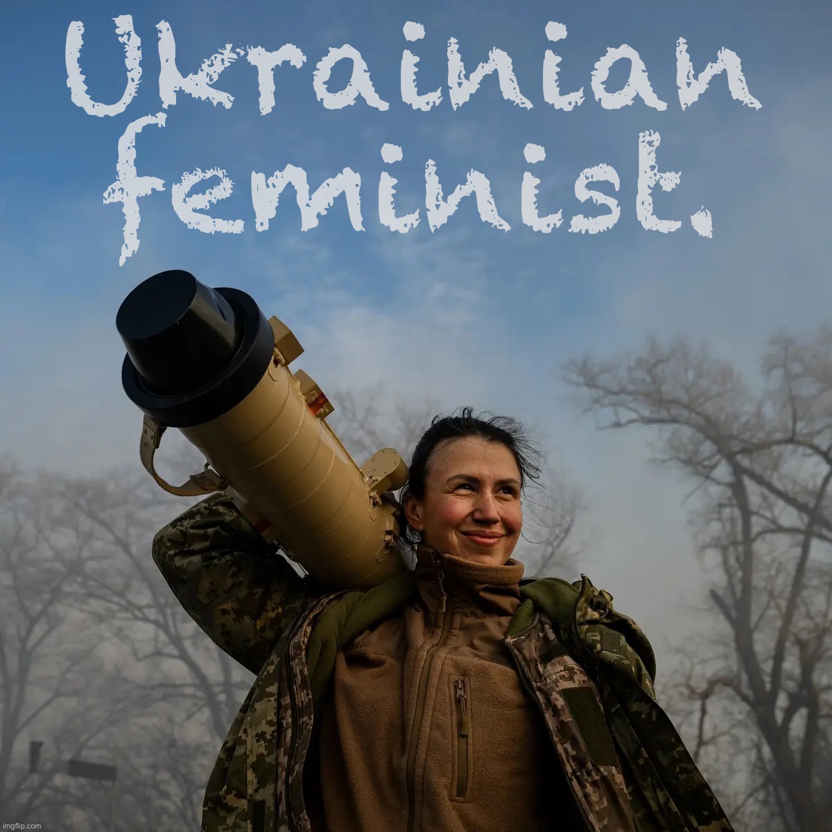 Ukrainian commander of anti-tank missile unit hoists her Stugna-P missile launcher after an ambush on Russian troops near Kiev. | Ukrainian feminist. | image tagged in ukrainian missile launcher | made w/ Imgflip meme maker